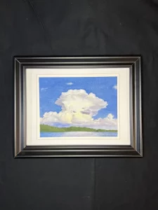 Anvil head cloud over Cable Bay. Lake Vermillion, MN (Original Watercolor Painting): Watercolor of a large anvil cloud above blue sky, green treeline, and water, set against a black background.